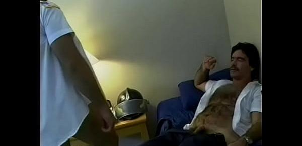  Hairy fireman relaxes on bed while getting amazing head